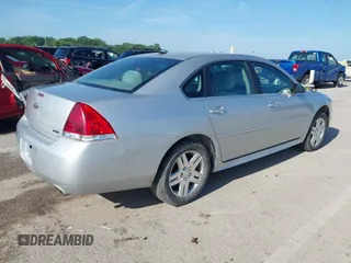 2014 Chevrolet Impala LT with VIN 2G1WB5E31E1180713, listed as a IAAI auction lot 42543751 with 263,010 mi miles and . Bid and sale history available at DreamBid. Image 4.