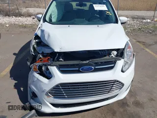 2016 Ford C-Max SEL z VIN 1FADP5CU8GL119275, wystawiony jako IAAI lot #41878985 z przebiegiem 39 580 mil mil oraz . Historia ofert i sprzedaży dostępna na DreamBid. Obrazek 12.