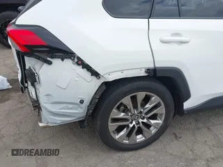 2019 Toyota RAV4 XLE Premium with VIN JTMA1RFV9KD513395, listed as a IAAI auction lot 41469143 with 28,406 mi miles. Bid and sale history available at carsss.com. Image 20.