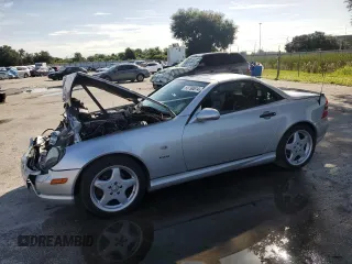 2000 Mercedes-Benz SLK-Class Kompressor with VIN WDBKK47F6YF164963, listed as a Copart auction lot 68790614 with 102,997 mi miles and Salvage Title. Bid and sale history available at carsss.com. Image 1.