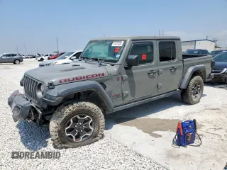 2021 Jeep Gladiator Rubicon with VIN 1C6JJTBG4ML610136, listed as a Copart auction lot 57437555 with Not provided miles and Salvage title. Bid and sale history available at DreamBid. Image 1.