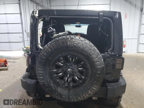 2018 Jeep Wrangler JK Unlimited Sahara with VIN 1C4BJWEG2JL869892, listed as a Copart auction lot 74474184 with 82,098 mi miles and Salvage Title. Bid and sale history available at carsss.com. Image 6.