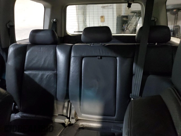 2003 Honda Pilot EX z VIN 2HKYF18693H614665, wystawiony jako Copart lot #57053175 z przebiegiem 291 627 mil mil oraz Czysty tytuł • Clean title. Historia ofert i sprzedaży dostępna na DreamBid. Obrazek 10.