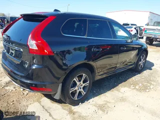 2015 Volvo XC60 T6 Drive-E Platinum with VIN YV449MDM5F2682413, listed as a IAAI auction lot 41791339 with 145,939 mi miles. Bid and sale history available at carsss.com. Image 4.