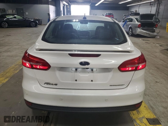 2017 Ford Focus Titanium with VIN 1FADP3J25HL213184, listed as a Copart auction lot 61653155 with 120,883 mi miles and Clean title. Bid and sale history available at DreamBid. Image 6.