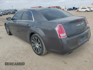 2013 Chrysler 300 with VIN 2C3CCABG7DH611105, listed as a IAAI auction lot 41769860 with 186,476 mi miles. Bid and sale history available at carsss.com. Image 3.