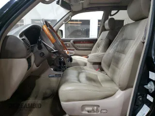 2002 Lexus LX 470 z VIN JTJHT00W023515545, wystawiony jako Copart lot #79218054 z przebiegiem 310 334 mil mil oraz Szkoda całkowita • Salvage title. Historia ofert i sprzedaży dostępna na DreamBid. Obrazek 7.