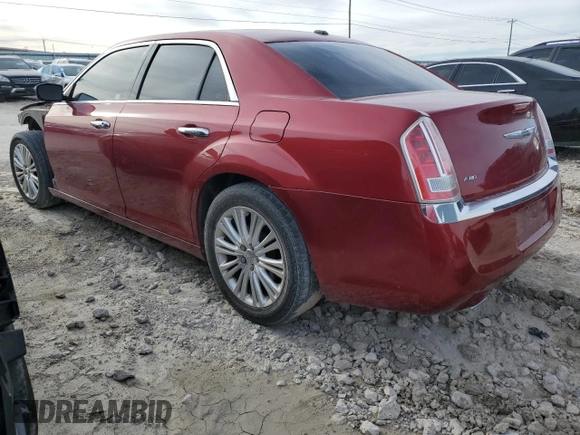 2012 Chrysler 300 C with VIN 2C3CCAKT3CH197140, listed as a Copart auction lot 82628384 with 167,304 mi miles and Salvage Title. Bid and sale history available at DreamBid. Image 2.
