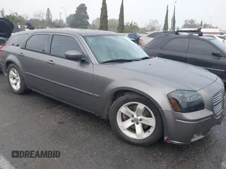 2005 Dodge Magnum RT with VIN 2D4GV58265H500284, listed as a IAAI auction lot 41194672 with 104,894 mi miles. Bid and sale history available at carsss.com. Image 13.