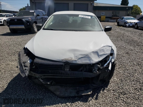 2014 Volkswagen Jetta S with VIN 3VW2K7AJ2EM303673, listed as a Copart auction lot 62909235 with 69,592 mi miles and Salvage title. Bid and sale history available at DreamBid. Image 5.