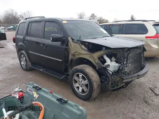 2011 Honda Pilot Touring with VIN 5FNYF4H94BB089930, listed as a IAAI auction lot 41477596 with 171,831 mi miles. Bid and sale history available at carsss.com. Image 1.