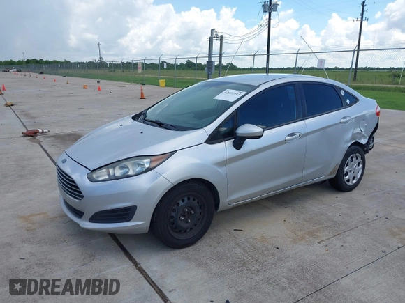 2014 Ford Fiesta S with VIN 3FADP4AJ6EM211807, listed as a IAAI auction lot 42601443 with 163,459 mi miles and . Bid and sale history available at DreamBid. Image 2.