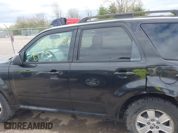 2011 Mercury Mariner with VIN 4M2CN8B7XBKJ01717, listed as a IAAI auction lot 42030587 with 115,766 mi miles and . Bid and sale history available at DreamBid. Image 14.