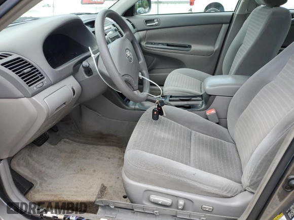 2005 Toyota Camry LE z VIN 4T1BE30K45U550097, wystawiony jako Copart lot #57962105 z przebiegiem 201 727 mil mil oraz Szkoda całkowita • Salvage title. Historia ofert i sprzedaży dostępna na DreamBid. Obrazek 8.