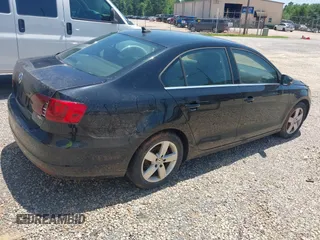 2014 Volkswagen Jetta TDI w/Premium with VIN 3VW3L7AJ6EM420044, listed as a IAAI auction lot 42569620 with 143,482 mi miles and . Bid and sale history available at DreamBid. Image 4.