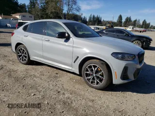 2023 BMW X4 M40i with VIN 5UX43DT00P9R86047, listed as a Copart auction lot 47321295 with 21,640 mi miles and Salvage title. Bid and sale history available at DreamBid. Image 4.