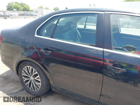 2009 Volkswagen Jetta SE with VIN 3VWRM71K79M166916, listed as a IAAI auction lot 42400659 with 166,061 mi miles and . Bid and sale history available at DreamBid. Image 12.
