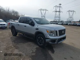 2017 Nissan Titan SL z VIN 1N6AA1E58HN506456, wystawiony jako IAAI lot #41521294 z przebiegiem 59 252 mil mil oraz . Historia ofert i sprzedaży dostępna na DreamBid. Obrazek 1.