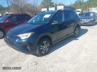 2017 Toyota RAV4 LE with VIN JTMZFREV9HJ719316, listed as a IAAI auction lot 41497253 with 98,357 mi miles. Bid and sale history available at carsss.com. Image 17.