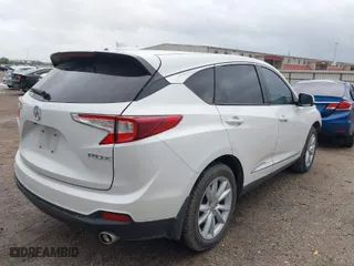 2020 Acura RDX with VIN 5J8TC1H38LL011552, listed as a IAAI auction lot 40999575 with 164,232 mi miles. Bid and sale history available at carsss.com. Image 4.