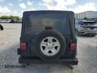 1998 Jeep Wrangler SE with VIN 1J4FY29P6WP705491, listed as a Copart auction lot 61873695 with 195,678 mi miles and Clean title. Bid and sale history available at DreamBid. Image 6.
