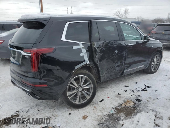 2021 Cadillac XT6 Premium Luxury with VIN 1GYKPDRS3MZ165049, listed as a Copart auction lot 45456145 with 57,112 mi miles and Salvage title. Bid and sale history available at DreamBid. Image 3.