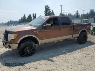 2011 Ford F-150 XLT with VIN 1FTFW1ET7BFB52777, listed as a Copart auction lot 61212505 with 181,941 mi miles and Salvage title. Bid and sale history available at DreamBid. Image 1.