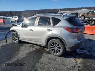 2013 Mazda CX-5 Grand Touring with VIN JM3KE4DE3D0138832, listed as a Copart auction lot 87681935 with 133,836 mi miles and Salvage Title. Bid and sale history available at carsss.com. Image 2.