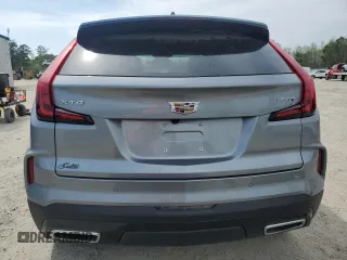 2024 Cadillac XT4 FWD Premium Luxury with VIN 1GYFZCR48RF169081, listed as a Copart auction lot 52429215 with 13,630 mi miles and Salvage title. Bid and sale history available at DreamBid. Image 6.