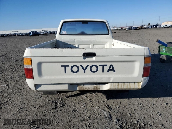 1990 Toyota Pickup with VIN JT4RN81R1L0049863, listed as a Copart auction lot 42832405 with 230,913 mi miles and Salvage title. Bid and sale history available at DreamBid. Image 6.