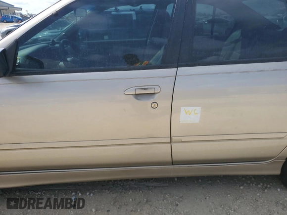 2002 Infiniti G20 Luxury z VIN JNKCP11A12T501940, wystawiony jako Copart lot #74041014 z przebiegiem Nie podano mil oraz Szkoda całkowita • Salvage title. Historia ofert i sprzedaży dostępna na DreamBid. Obrazek 12.