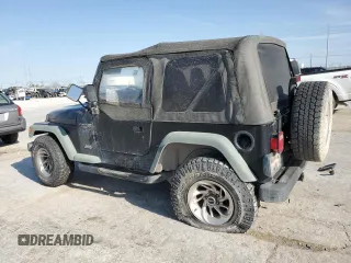 1998 Jeep Wrangler Sport with VIN 1J4FY19S1WP757593, listed as a Copart auction lot 52382945 with 230,086 mi miles and Salvage Title. Bid and sale history available at carsss.com. Image 2.