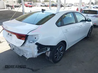 2023 Kia Forte LXS with VIN 3KPF24AD9PE578435, listed as a IAAI auction lot 41980894 with 59,817 mi miles and . Bid and sale history available at DreamBid. Image 4.