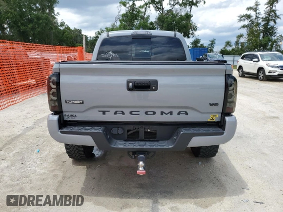 2020 Toyota Tacoma SR5 z VIN 3TMAZ5CN0LM115004, wystawiony jako Copart lot #55343295 z przebiegiem 82 865 mil mil oraz Nie do naprawy • Non repairable. Historia ofert i sprzedaży dostępna na DreamBid. Obrazek 6.