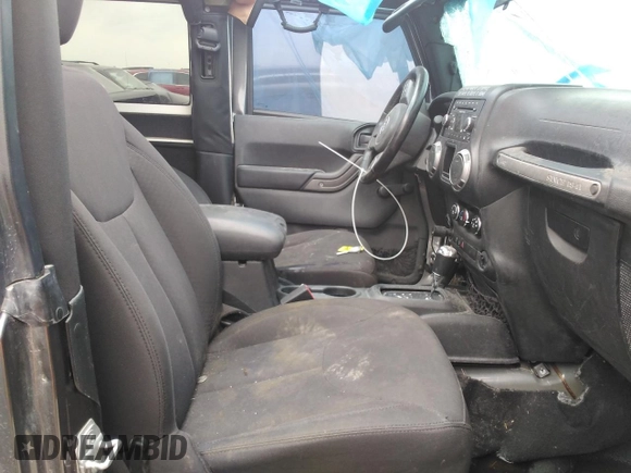 2017 Jeep Wrangler Willys Wheeler with VIN 1C4AJWAG9HL673766, listed as a Copart auction lot 43132555 with 129,422 mi miles and Salvage Title. Bid and sale history available at DreamBid. Image 7.