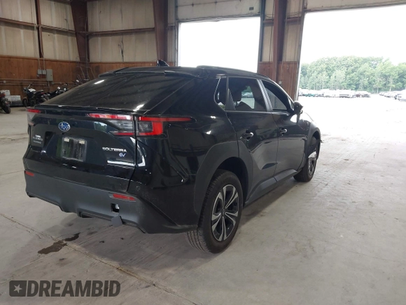 2024 Subaru Solterra Touring with VIN JTMABABA9RA052065, listed as a IAAI auction lot 42648692 with 13,880 mi miles and . Bid and sale history available at DreamBid. Image 4.