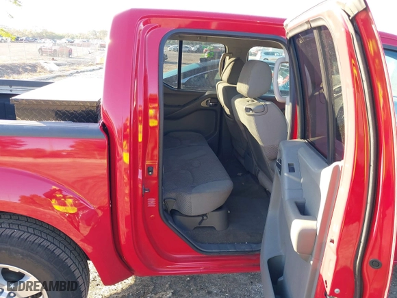 2009 Nissan Frontier SE with VIN 1N6AD07U19C419811, listed as a IAAI auction lot 41090904 with 141,119 mi miles. Bid and sale history available at carsss.com. Image 8.