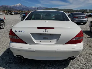 2008 Mercedes-Benz SL 550 with VIN WDBSK71FX8F141776, listed as a Copart auction lot 50004185 with 58,668 mi miles and Salvage title. Bid and sale history available at DreamBid. Image 6.