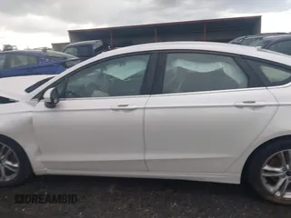 2018 Ford Fusion SE z VIN 3FA6P0H75JR159448, wystawiony jako IAAI lot #42262839 z przebiegiem 144 353 mil mil oraz . Historia ofert i sprzedaży dostępna na DreamBid. Obrazek 14.