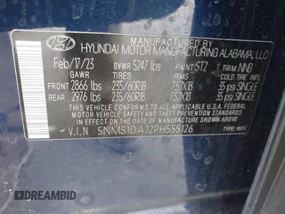 2023 Hyundai Santa Fe SE z VIN 5NMS1DAJ2PH555126, wystawiony jako IAAI lot #41992424 z przebiegiem 34 263 mil mil oraz . Historia ofert i sprzedaży dostępna na DreamBid. Obrazek 9.