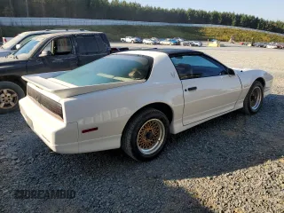 1988 Pontiac Firebird z VIN 1G2FW2183JL204840, wystawiony jako Copart lot #69142254 z przebiegiem 62 529 mil mil oraz Czysty tytuł • Clean title. Historia ofert i sprzedaży dostępna na DreamBid. Obrazek 3.
