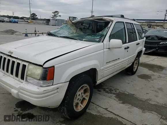 1997 Jeep Grand Cherokee Limited with VIN 1J4GX78YXVC716353, listed as a Copart auction lot 85207974 with 115,527 mi miles and Salvage Title. Bid and sale history available at carsss.com. Image 12.