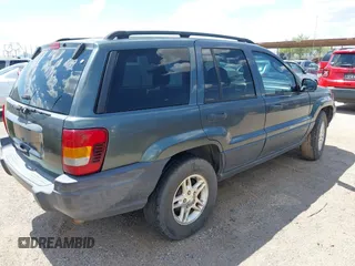2003 Jeep Grand Cherokee Laredo with VIN 1J4GW48S53C571247, listed as a IAAI auction lot 42416174 with 175,328 mi miles and . Bid and sale history available at DreamBid. Image 4.