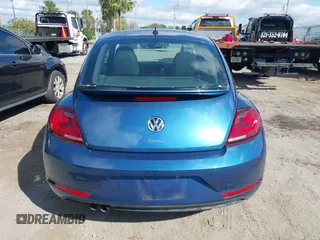 2018 Volkswagen Beetle S with VIN 3VWFD7AT9JM712664, listed as a IAAI auction lot 41634663 with 72,649 mi miles. Bid and sale history available at carsss.com. Image 16.