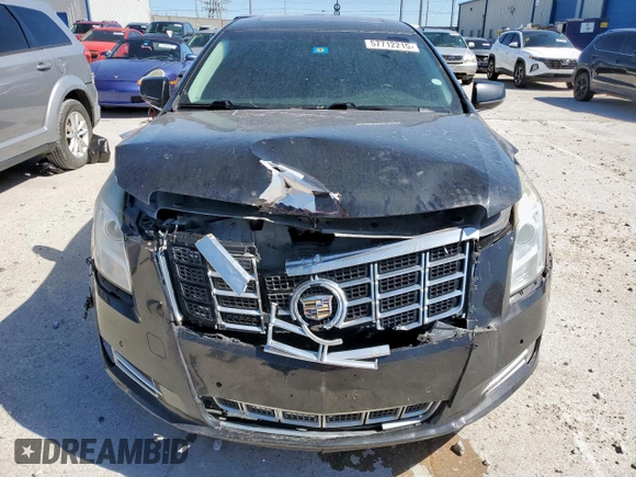 2014 Cadillac XTS Luxury z VIN 2G61M5S39E9302853, wystawiony jako Copart lot #57712215 z przebiegiem 180 886 mil mil oraz Czysty tytuł • Clean title. Historia ofert i sprzedaży dostępna na DreamBid. Obrazek 5.