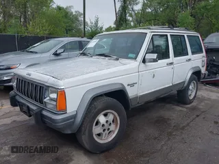 1991 Jeep Cherokee with VIN 1J4FJ58S3ML563620, listed as a IAAI auction lot 42131093 with 198,942 mi miles and . Bid and sale history available at DreamBid. Image 2.