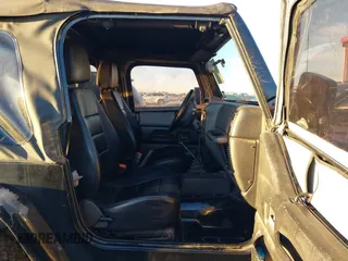 1997 Jeep Wrangler SE with VIN 1J4FY29P0VP415195, listed as a IAAI auction lot 41221078 with 137,046 mi miles. Bid and sale history available at carsss.com. Image 5.