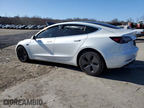 2020 Tesla Model 3 Long Range z VIN 5YJ3E1EB0LF628130, wystawiony jako Copart lot #50706955 z przebiegiem 67 384 mil mil oraz Szkoda całkowita • Salvage title. Historia ofert i sprzedaży dostępna na DreamBid. Obrazek 2.