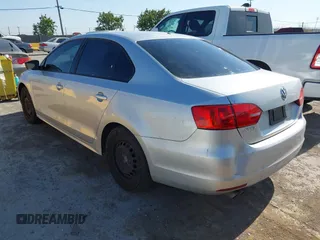 2014 Volkswagen Jetta S with VIN 3VW2K7AJ0EM391770, listed as a IAAI auction lot 42677433 with 200,032 mi miles and . Bid and sale history available at DreamBid. Image 3.