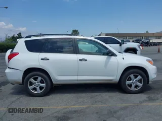 2007 Toyota RAV4 with VIN JTMZK33V875013053, listed as a IAAI auction lot 42133759 with 142,572 mi miles. Bid and sale history available at carsss.com. Image 13.